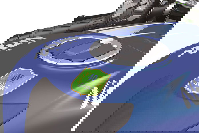 The fuel tank of a Kawasaki sports motorcycle